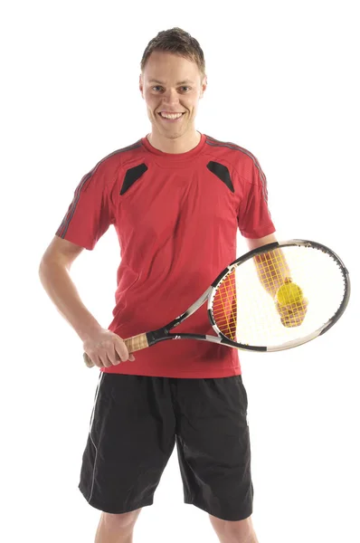 穿着红色紧身衣和网球拍的年轻人打网球 与白色背景隔离 — 图库照片