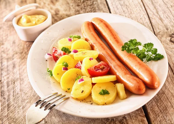 Tasty Rustic Lunch Made Boiled Potatoes Sausages Garnished Prasley Tomatoes — kuvapankkivalokuva
