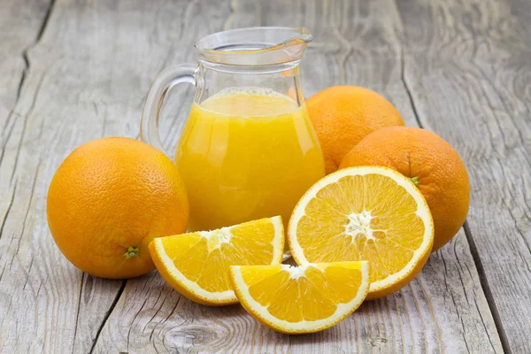 Narancslé Friss Gyümölcsöket Háttér — Stock Fotó
