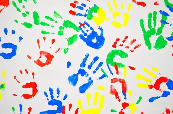 colored handprints of children