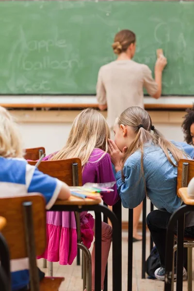 Vista Trasera Las Niñas Hablando Durante Clase —  Fotos de Stock