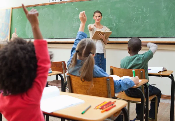 Back View Primary Students Raising Hands — Stock Photo, Image