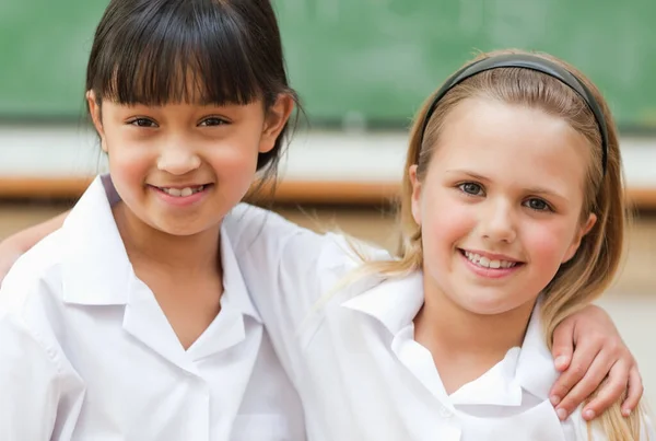 Smiling Small School Girls Front Blackboard — Foto de Stock