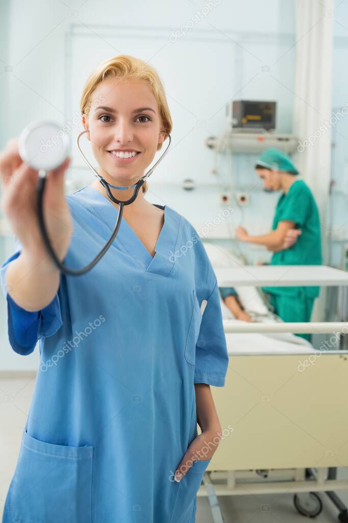 Female Doctor Holding A Stethoscope Stock Photo - Image of 