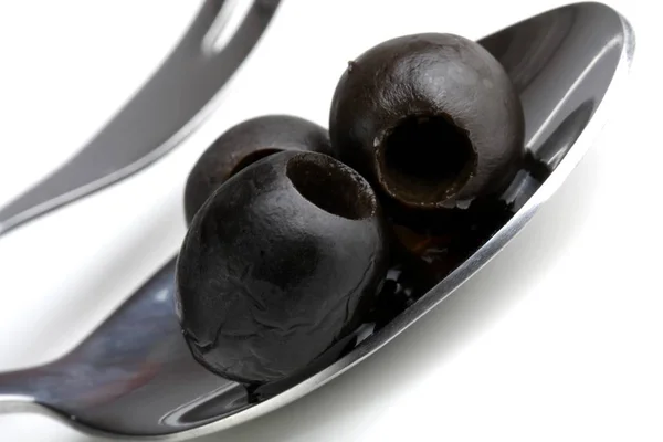Black Olives Metal Spoon — Stock Photo, Image