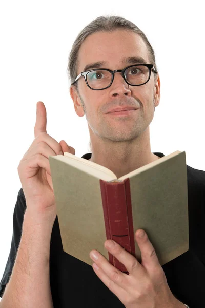 Mann Mit Buch Hebt Zeigefinger — Stockfoto