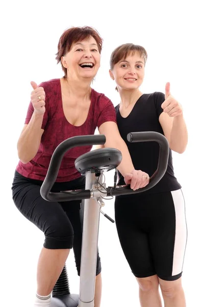 Spinnende Seniorin Mit Trainer — Stockfoto