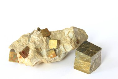 pyrite crystals in the parent rock and single cubic crystal clipart