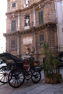 Buggy in the Quattro Canti in the Baroque square in Palermo, Italy clipart