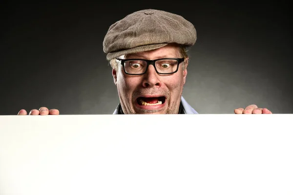 stock image funny man in glasses with empty placard