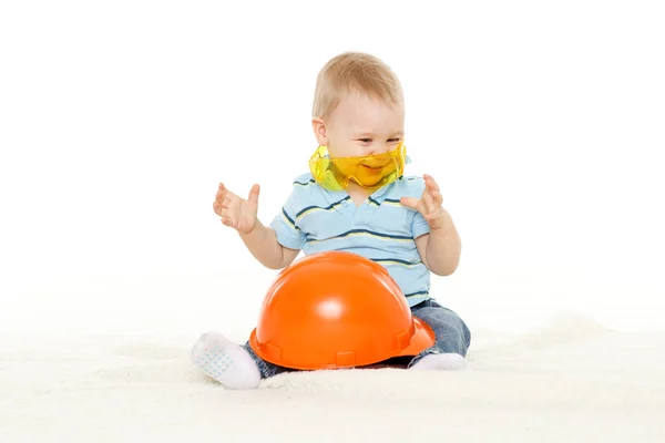 Little Child Plays Orange Construction Protective Helmet Huge Yellow Protective — Stock Photo, Image