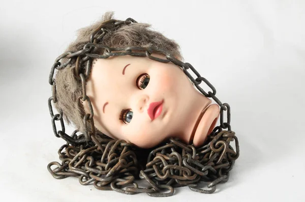 Vintage Plastic Scary Doll Head Chain White Background — Stok Foto