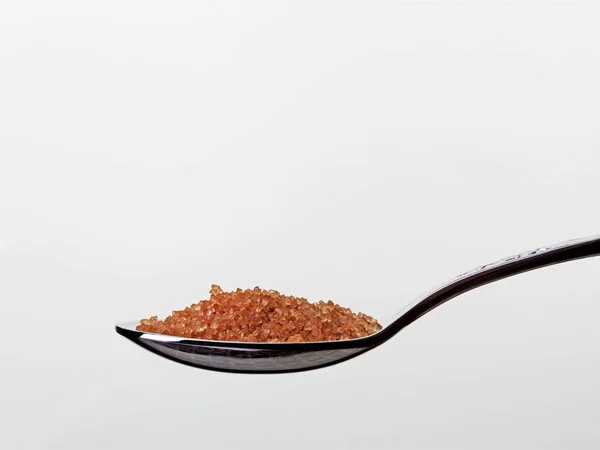 Nahaufnahme Eines Teelöffels Mit Braunem Zucker Weißer Hintergrund — Stockfoto