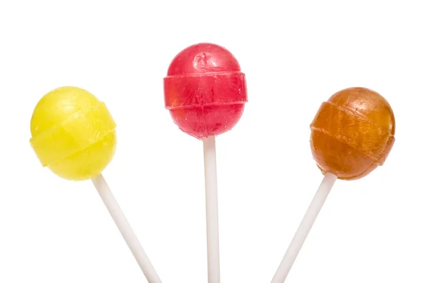 Tres Lollipop Amarillo Rojo Marrón Frente Fondo Blanco — Foto de Stock