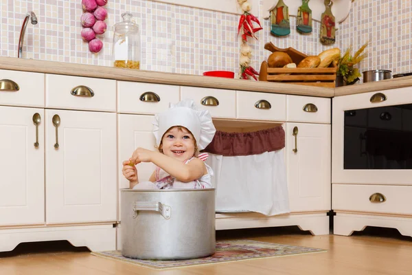 Little Girl Apron Cap Cook Sitting Kitchen House Mother Helper — Stock Photo, Image