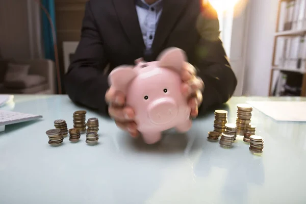 Close Businessperson Hand Shaking Piggy Bank Stacked Coins — Stock Photo, Image
