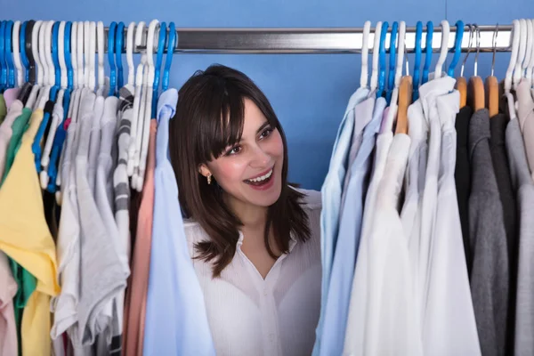Happy Young Woman Looking Variety Clothes Clothes Rail — Stock Photo, Image
