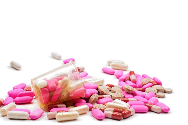 白で隔離されたピンクの錠剤のショット — ストック写真