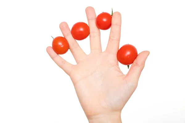 Frauenhand Mit Tomaten Zwischen Den Fingern — Stockfoto