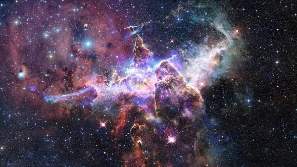 Mystic Mountain. Region in the Carina Nebula imaged by the Hubble Space Telescope. Elements of this image furnished by NASA.