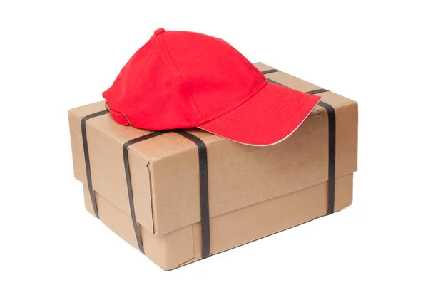 Paket Mit Einem Postbotenhut Auf Dem Kopf Isoliert Auf Weißem — Stockfoto