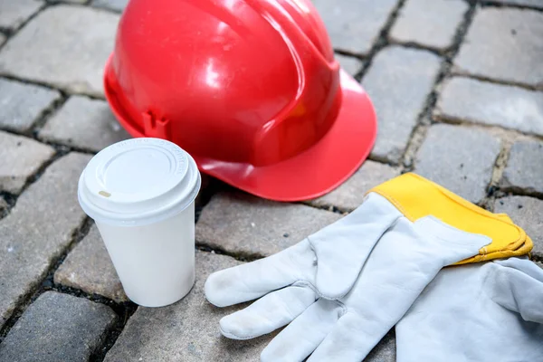 Red Helmet Coffee Mug Work Gloves Stones — Stock Photo, Image