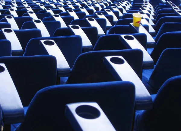 Rows of seats in the football stadium