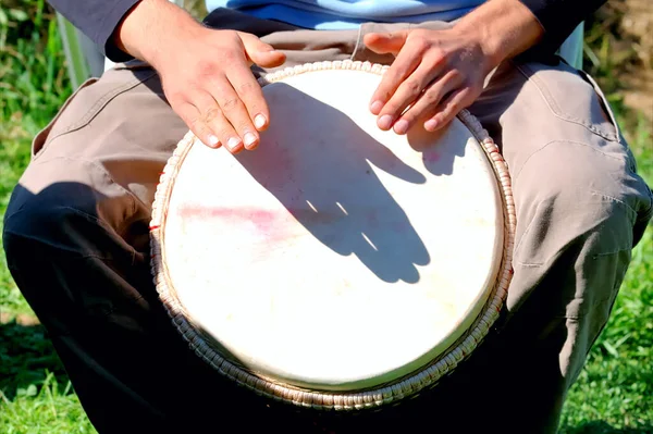 Close Hands Holding Drum — Stock Photo, Image