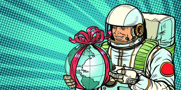 Astronaut Dává Planetě Zemi Pop Art Retro Vektor Ilustrace Kreslení — Stockový vektor