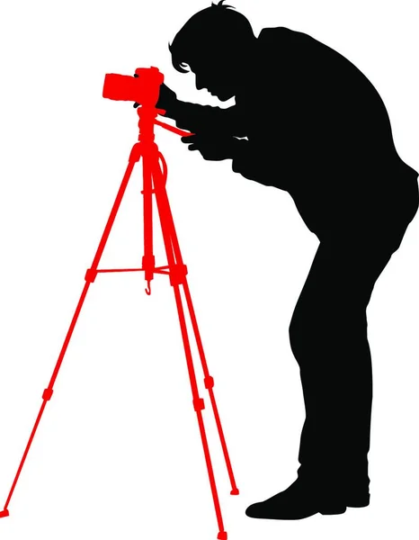 Kameralı Bir Kameraman Beyaz Arka Planda Siluetler Vektör Çizimi Kameralı — Stok Vektör