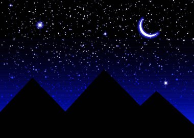 Nights sky over the pyramids in Egypt with a cresent moon
