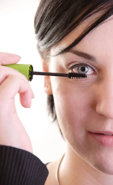 Young Woman Applying Mascara Her Eyelashes — Stock Photo, Image