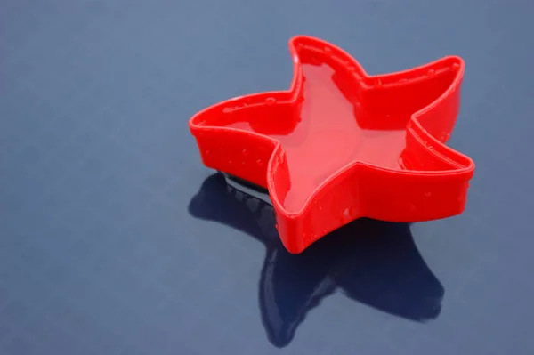 Carro Brinquedo Plástico Vermelho Fundo Preto — Fotografia de Stock