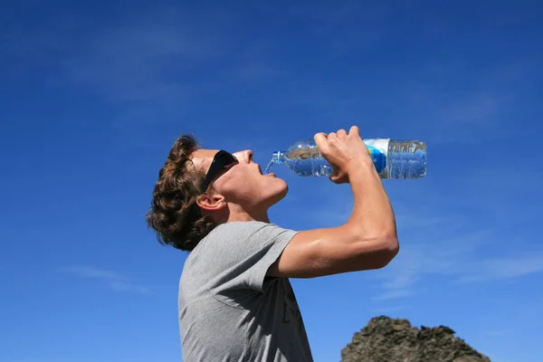 Young Man Drinks Water Bottle — Stock Photo, Image