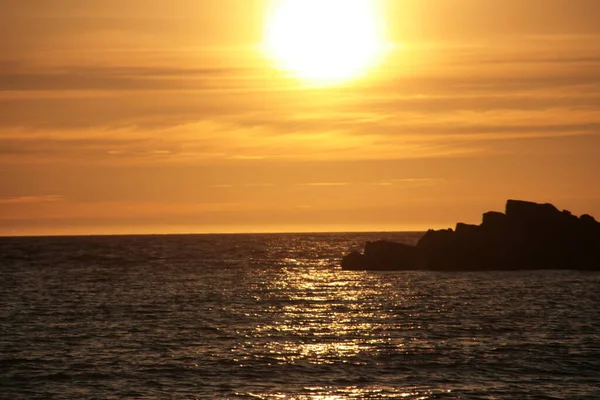 Auringonlasku Merellä — kuvapankkivalokuva