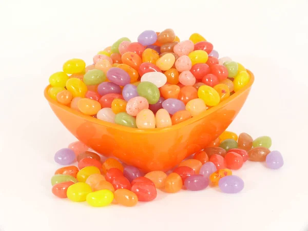 jelly candies in a bowl on white background