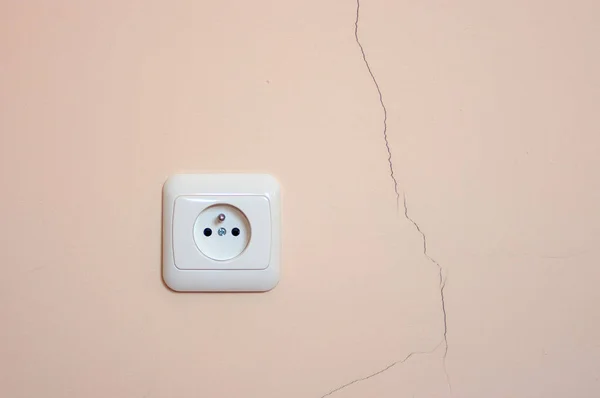Crack Wall Power Outlet — Stock Photo, Image