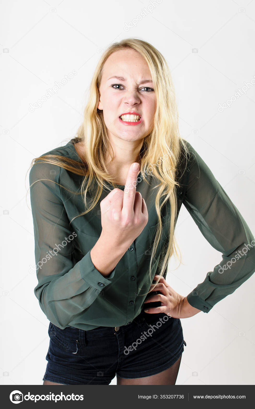 Attractive Young Woman Long Blonde Hair Looks Nasty Makes Stinkefinger Stock  Photo by ©PantherMediaSeller 353207736