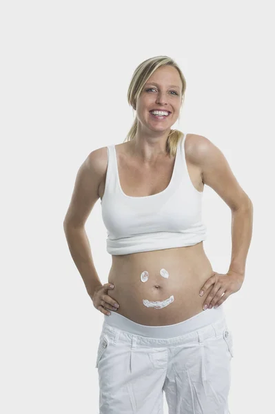 Pregnant Woman Face Her Stomach Stock Image
