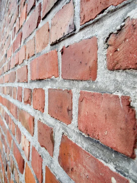 Flache Winkelaufnahme Einer Der Perspektive Verlaufenden Ziegelwand — Stockfoto