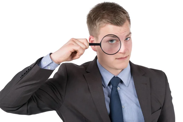 Vrijgegeven Foto Van Een Jonge Zakenman Die Door Een Vergrootglas — Stockfoto