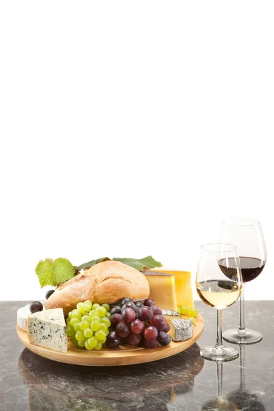 stock image Gourmet food,cheese platter with bread and wine