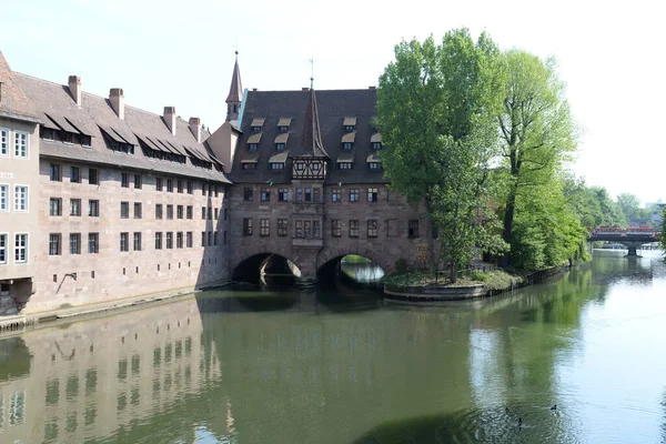 holy spirit spitall,hospital,Nuremberg,architecture,franken,bayern,altstadt,stadt,inner city,holy-spirit-spital,pegnitz,bach,river,seniorenwohnheim