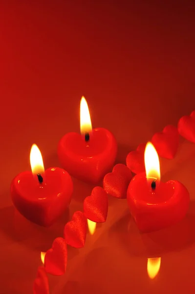 Three Bright Red Candles Heart Shape Fabric Hearts — Stock Photo, Image