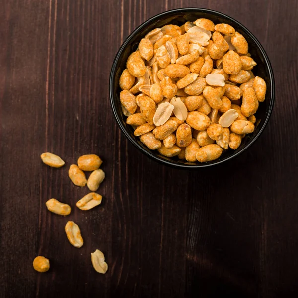 Peanuts Spiced Bowl Wooden Base — Stock Photo, Image