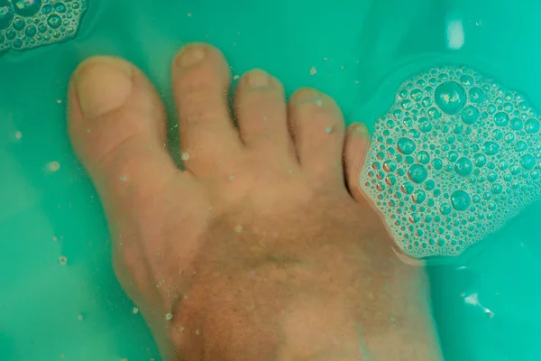 Foot in a foot bath