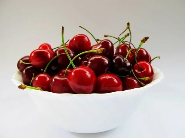 Ízletes Piros Cseresznye Háttérben Közelről — Stock Fotó
