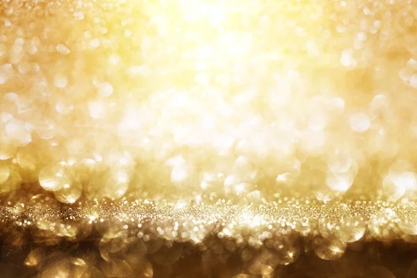 Abstrato Dourado Brilho Luzes Fundo Para Uma Ocasião Solene — Fotografia de Stock