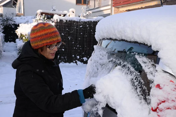 snow,ice,car,winter,ice scratching,ice scratching,wintry,snow,vbetravels,woman,person,ice scraper,road-safe,kfz,car,car,pkw