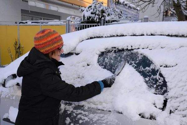 snow,ice,car,winter,ice scratching,ice scratching,wintry,snow,vbetravels,woman,person,ice scraper,road-safe,kfz,car,car,pkw